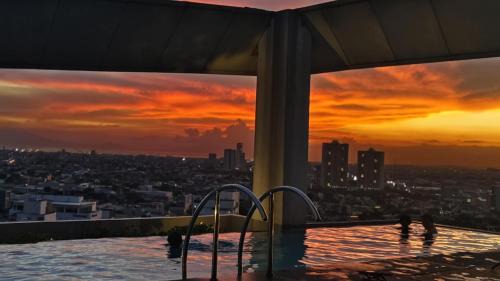 Phil-Am Apartment | Deluxe One Bedroom Suite by Christine Suites infront of Trinoma Mall