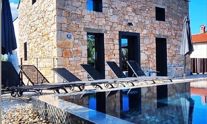 Drenje House | Design lovers stone house with stunning pool and a walking distance to the beach