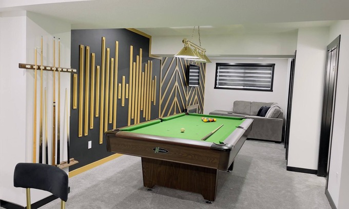 Airdrie House | Designer suite with a Pool Table/Xbox/Arcade/Jumbo Jenga