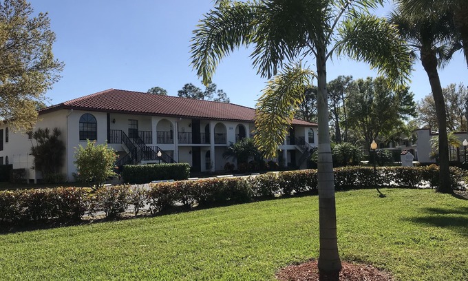 Gleneagles Condo | Desirable 2nd Floor End Unit Condo in Lely Area