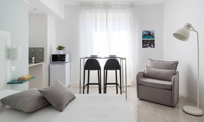 Syracuse Apartment | Dioniso Smart Suite with balcony by Wonderful Italy