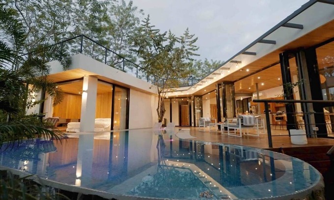 Playa Langosta House | Discover the essence of tropical living at Casa Las Abejas, a stylish villa with a private pool, spacious design, and lush surroundings.