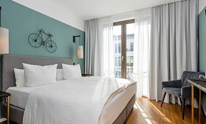 Bad Saarow Apartment | Doppelzimmer Terrasse, Dusche/WC - Velotel Bad Saarow