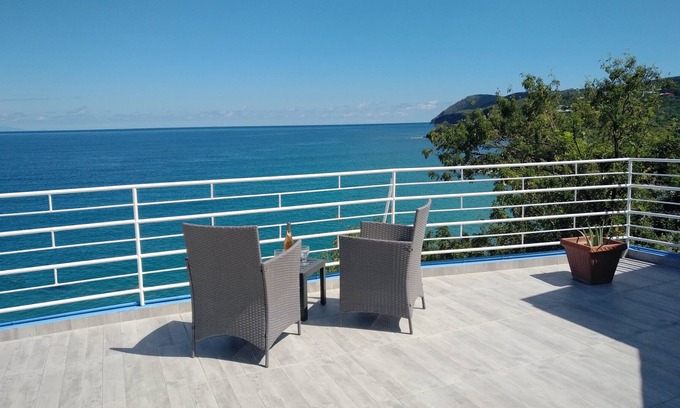 Deshaies Villa | Dream stay! Large villa with swimming pool, above the beach, sea view.