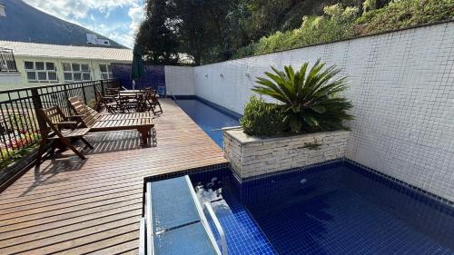 Itaipava Apartment | Duplex com garagem em Itaipava