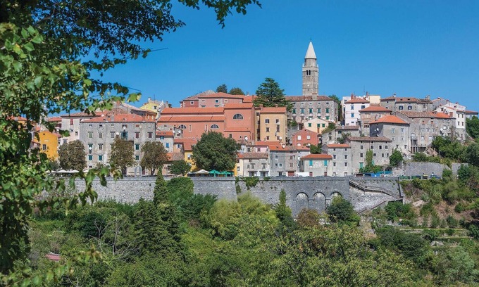 Kozljani House | Enjoy a relaxing time in this modern vacation home with pool.