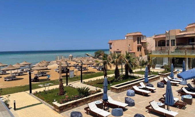 Al Ahyaa Apartment | Enjoy Beachfront apartment at elite resort , pool, Wi-Fi, unique location.