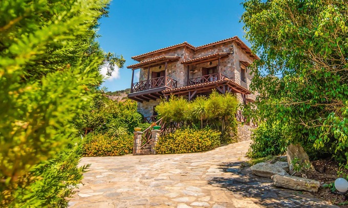Milatos House | Enjoy breathtaking sea views from the balconies and terraces of this beautiful vacation home set ami
