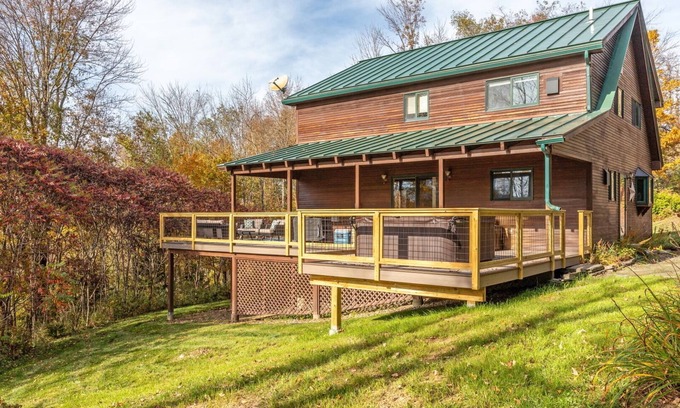 Lower Village House | Enjoy fall foliage from the hot tub!