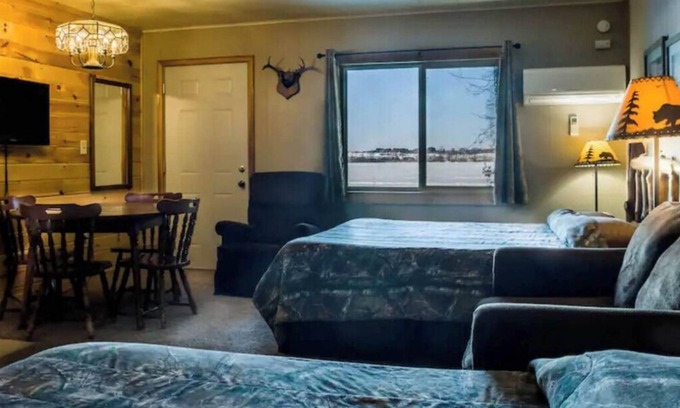 Rice Lake Apartment | Enjoy lakeside relaxation in Room 11 - The Hunting Lodge - Curriers Lakeview