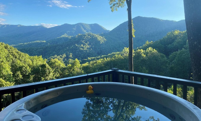 Stecoah House | Enjoy the beautiful view of the mountains in your private hot tub! Pet friendly