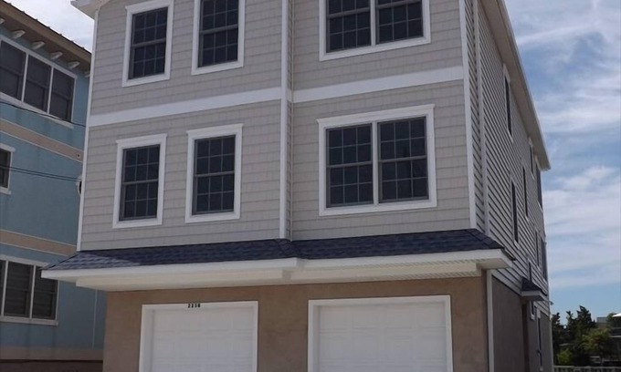 Avalon Condo | Enjoy the beautiful bay and sunset views from this top floor condo