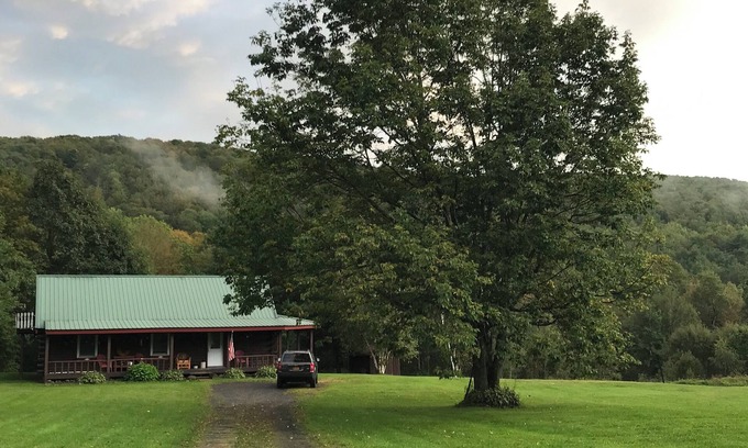 East Worcester Cabin | Escape to the country at our creek-side log cabin.