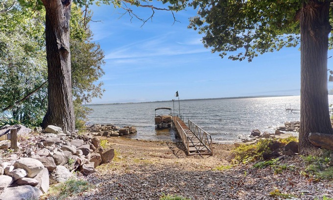 Chazy House | Escape to this spacious lakefront retreat with W/D, AC, firepit, & grill