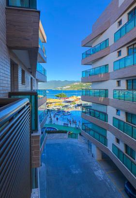Praia Grande House | Espaçoso Apto 2 Quartos com PISCINA, VISTA MAR e Churrasqueira- PERFEITO PARA FAMÍLIA na PRAIA DOS ANJOS RESIDENCE CLUB