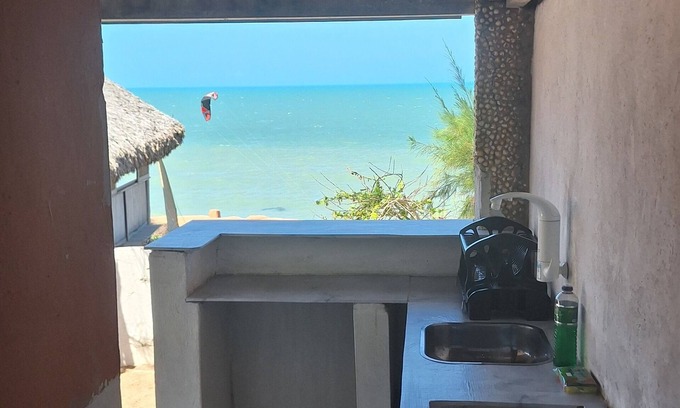 Canoa Quebrada House | Exclusive chalet in Vila dos Estevão facing the sea with your feet in the sand.