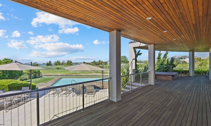 Westhampton House | Expansive and Modern Westhampton Home with Open Layout, Private Pool, Water.