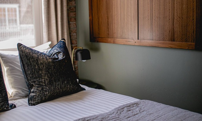 Jacksonville Hotel | Experience historic Jacksonville! This 1 BR Queen Guest Room offers boutique charm in the heart of wine country. Walk to the Britt Festival, Nespresso machine included. Ideal for a downtown escape for two.