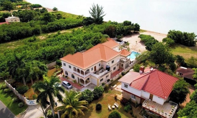 Lacovia Villa | Experience the natural unspoiled beauty of Black River w/ your own beach & pool