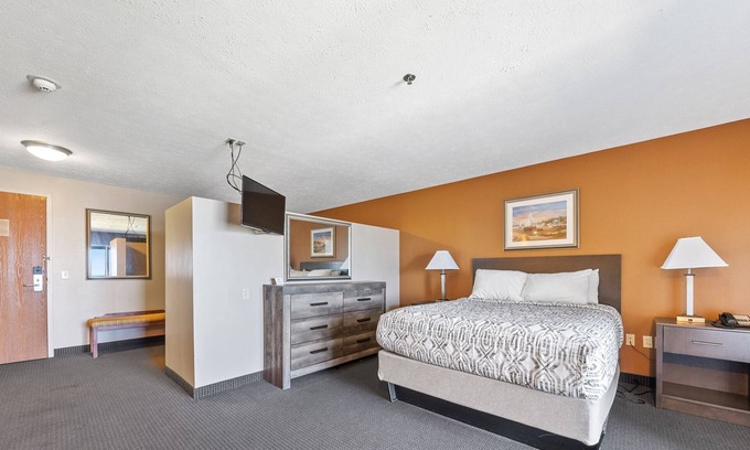 Put-in-Bay House | Experience Luxury and Comfort in Our Spacious Suite with Room Divider 318