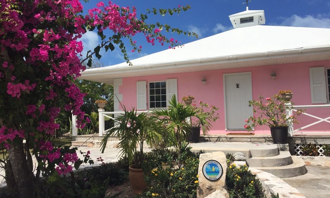 Hartswell House | Exuma Beautiful Waterfront Home with Dock on Gorgeous Moriah Harbour.