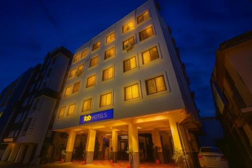 Nanded Hotel | FabHotel White House - Nr Sinhagad speciality Hospital