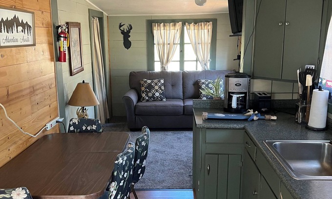 Itasca County Resort | Family friendly cabin close to playground. Amazing swimming beach