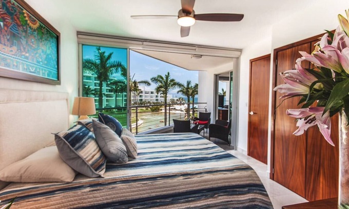 Flamingos Apartment | Family-friendly BEACHFRONT! Amazing pools and best beach around!