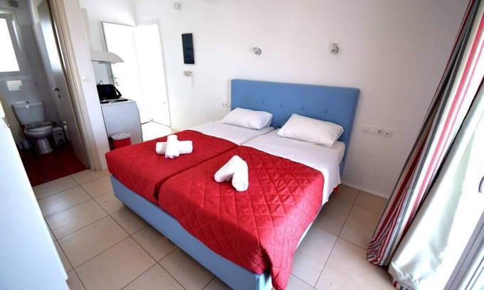 Glastros Apartment | Fantastic studio apartment for 2 people with kitchen and balcony with a view.