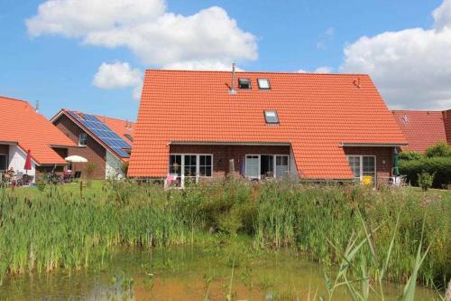 Rotacker House | Feriendorf Robbenplatte Burhave 1