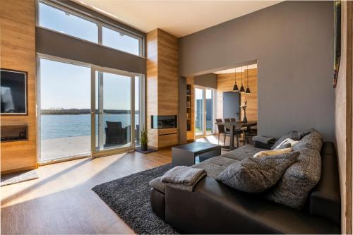 Lobnitz House | Ferienhaus SUNRISE am Mühlfeldsee