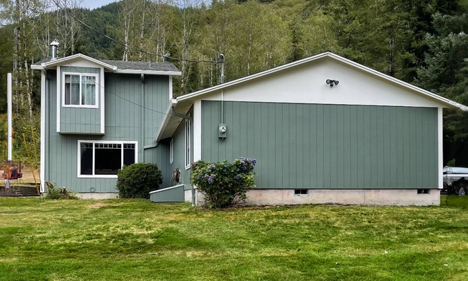 Tillamook Cottage | Fishing & hunting retreat with two suites, loft, forest views & seasonal firepit