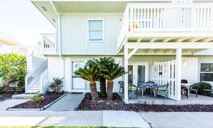 Port Aransas Villa | Flamingo House - First Floor Unit that’s a 5-7 minute walk to the beach.