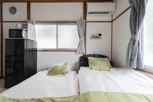 Chikushino Apartment | Free Wi-Fi, 7 minutes' walk from Nishitetsu Futsukaichi Station