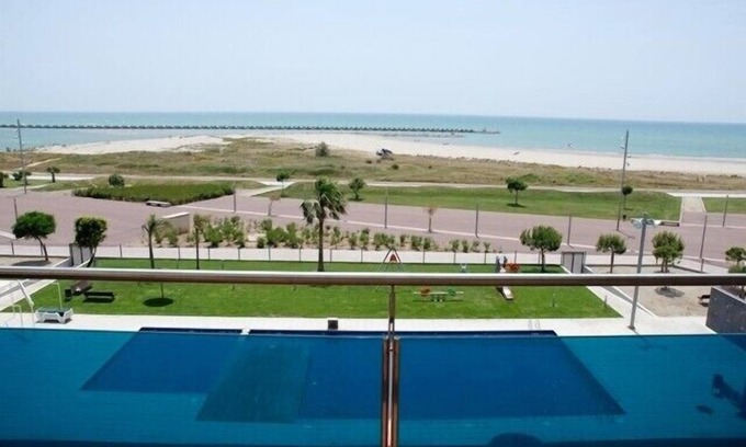 Cubelles Apartment | Frontline penthouse with pool & parking and incredible views on quiet beach