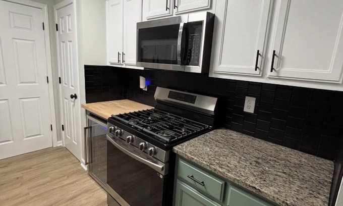 Church Street House | Fully Furnished Modern Home Patio with BBQ Grill for Relaxed Outdoor Living