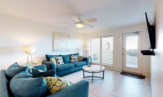 South Padre Island Condo | Fully Renovated Getaway with Beachfront Patio - Steps to Pool & Hot Tub