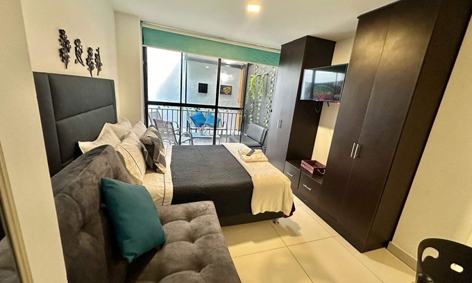 Chapinero Apartment | Furnished studio apartment with patio galerias chapinero super located in.