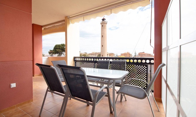 Canet de Berenguer Apartment | Global Properties: Apartment with terrace and swimming pool in Canet beach