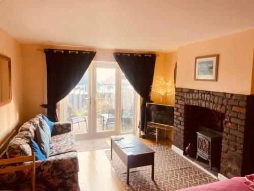 Uplands Apartment | Ground Floor - view of Lighthouse, Garden and Parking