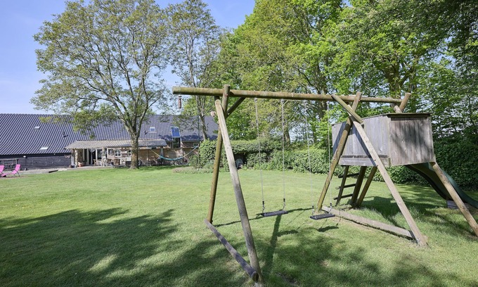 Handel House | Group farmhouse with garden in wooded area