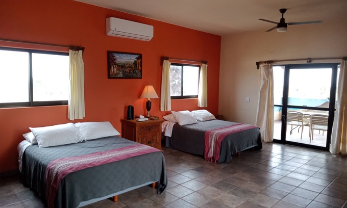 La Ribera Bed & Breakfast | Hacienda de Palmas: Room #1 Grande with two queen size beds and sofa bed
