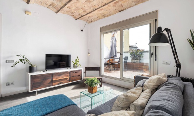 el Camp d'en Grassot i Gracia Nova Apartment | Heart of Gracia: Stylish 1BR Apartment with Terra