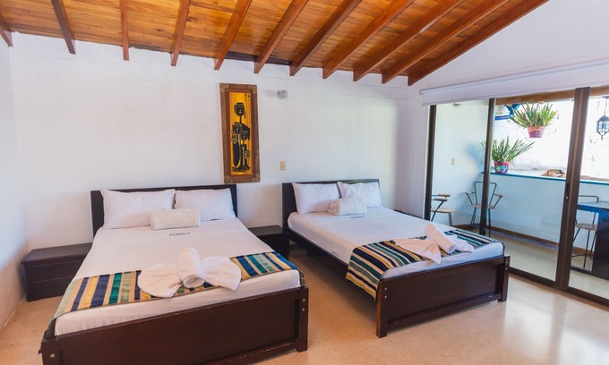 Guatape Hotel | Hermosa Habitación Deluxe Familiar En Guatape