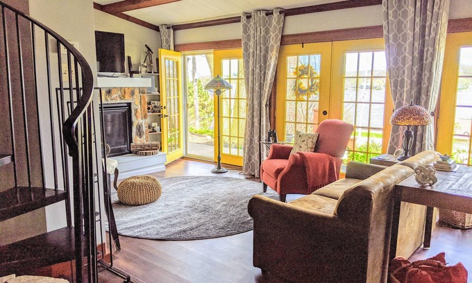 Le Claire Cottage | Historic Cottage in LeClaire w/full river views and 3 decks. Dogs welcome