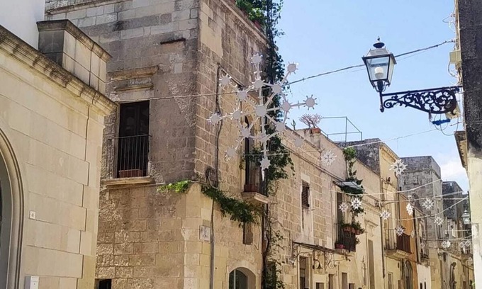 Martano House | Historic house with a fantastic balcony for unique evenings.