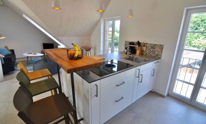 Baustert Apartment | Historic school - modern parlor