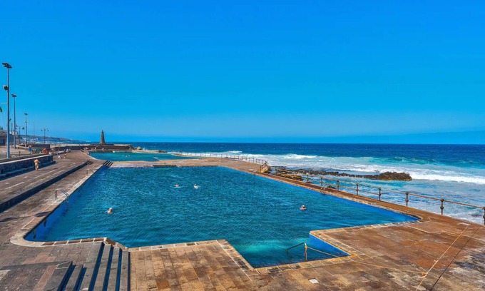 Bajamar Apartment | Holiday Apartment "Almar Bajamar" with Sea View, Shared Pool & Wi-Fi