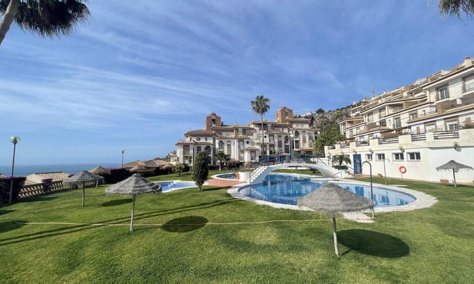 Almunecar Apartment | Holiday Apartment "Piso Jardines De Adnania B " near Beach with Shared Pool & Wi-Fi