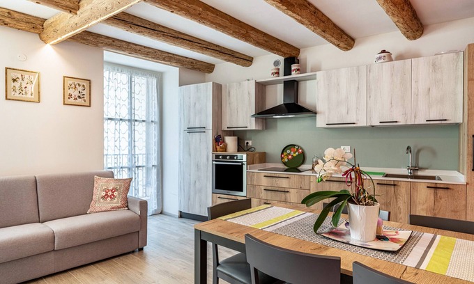 Levico Terme Apartment | Holiday Apartment 'L'Antica Corte Apt Angelina' with Mountain View, Balcony & Wi-Fi